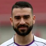 K. Gezos